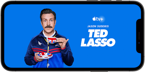 Apple TV+-programmet Ted Lasso streamat på en telefon.