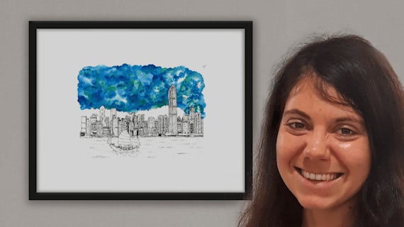 Laura with one of her paintings.