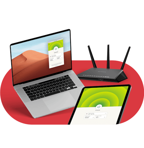 Laptop, tablet, and router, all secured with ExpressVPN.