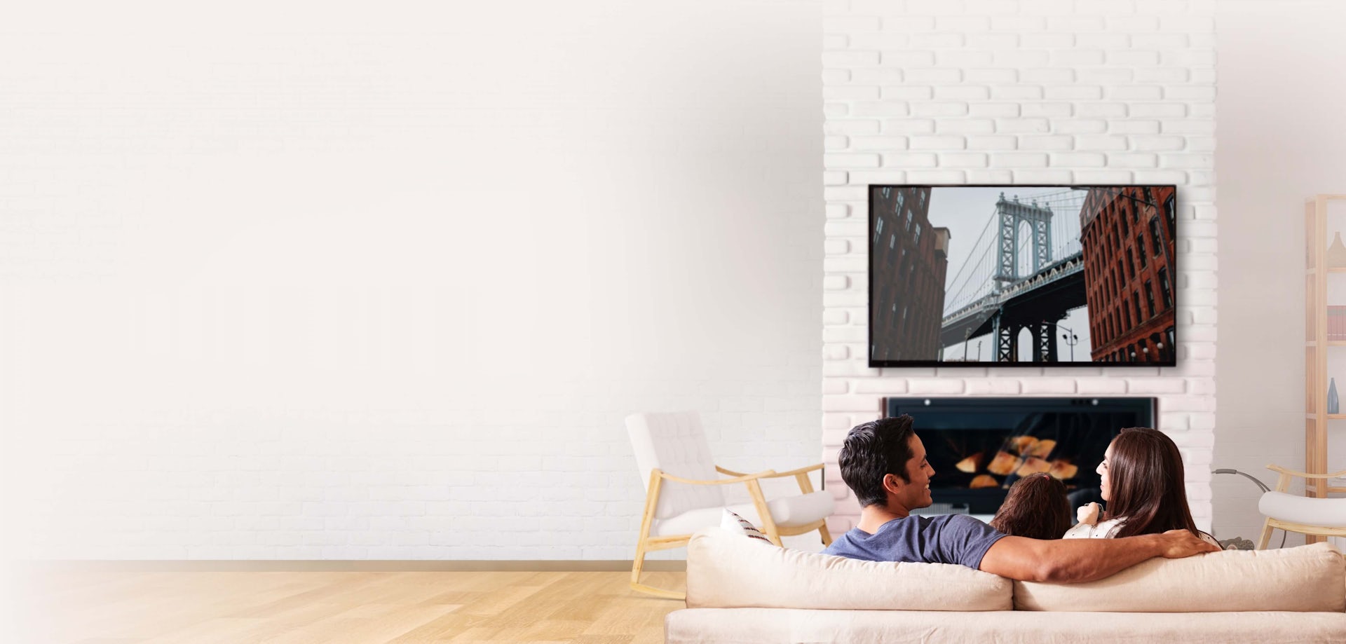 Couple watching TV on sofa at home