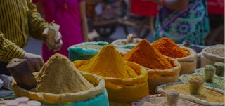 Colorful spices at a market in India.