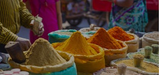 Colorful spices at a market in India.