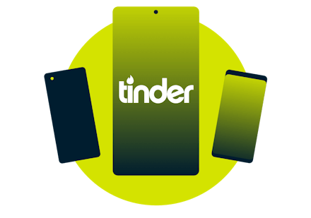 Mobile devices with the Tinder logo.