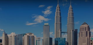 マレーシアのIPアドレス： クアラルンプールのペトロナス・タワーの背景写真。