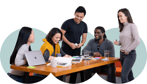 XV employees working together at a table employer branding career journey