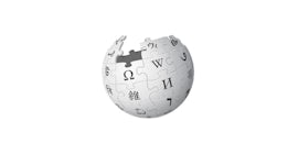Wikipedian logo kannettavan tietokoneen näytöllä.